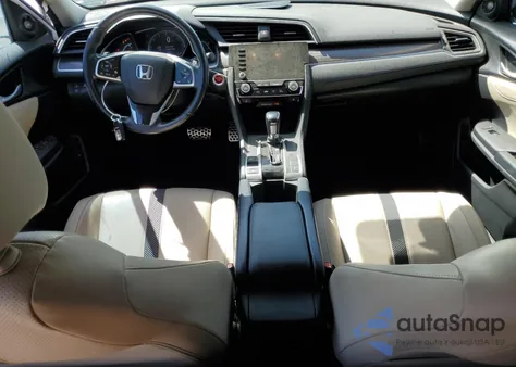 2021 Honda Civic Touring z USA, uszkodzony, nr VIN 19XFC1F95ME202326